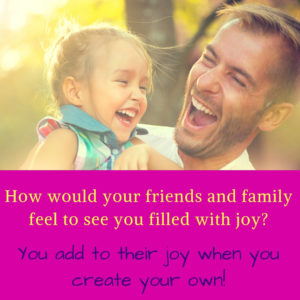 Father and daughter share a joyful moment. Creating joy for yourself spreads to others you love.